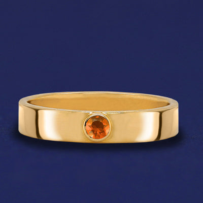 A solid yellow gold Fire Opal Gemstone Industrial ring