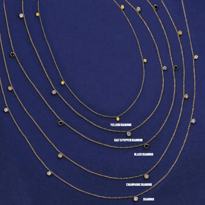 Five versions of the five Diamond Cable Necklace showing Yellow, Salt and Pepper, Black, Champagne, and Clear diamonds