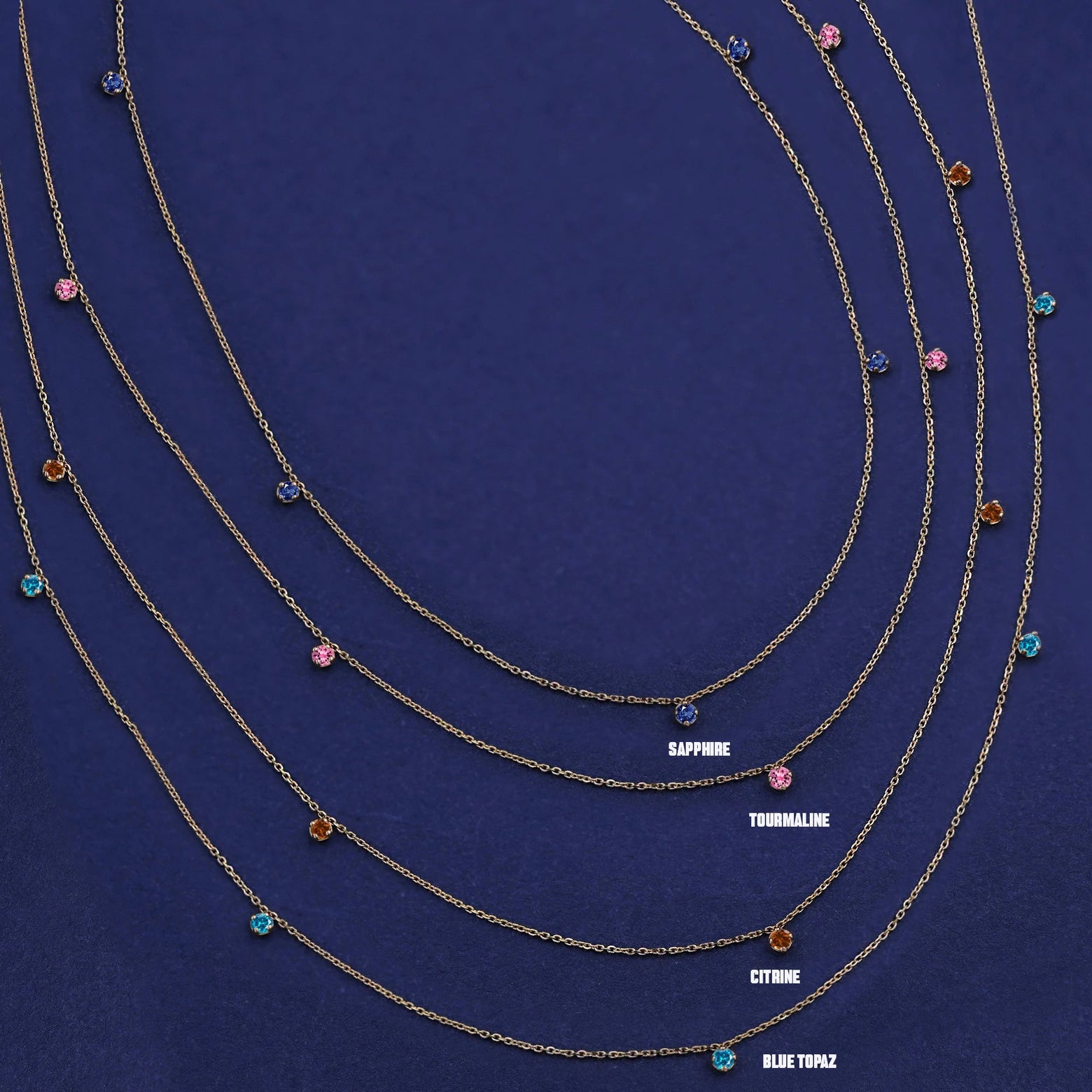 Four versions of the solid yellow gold 5 Gemstone Cable Necklace showing different stone options