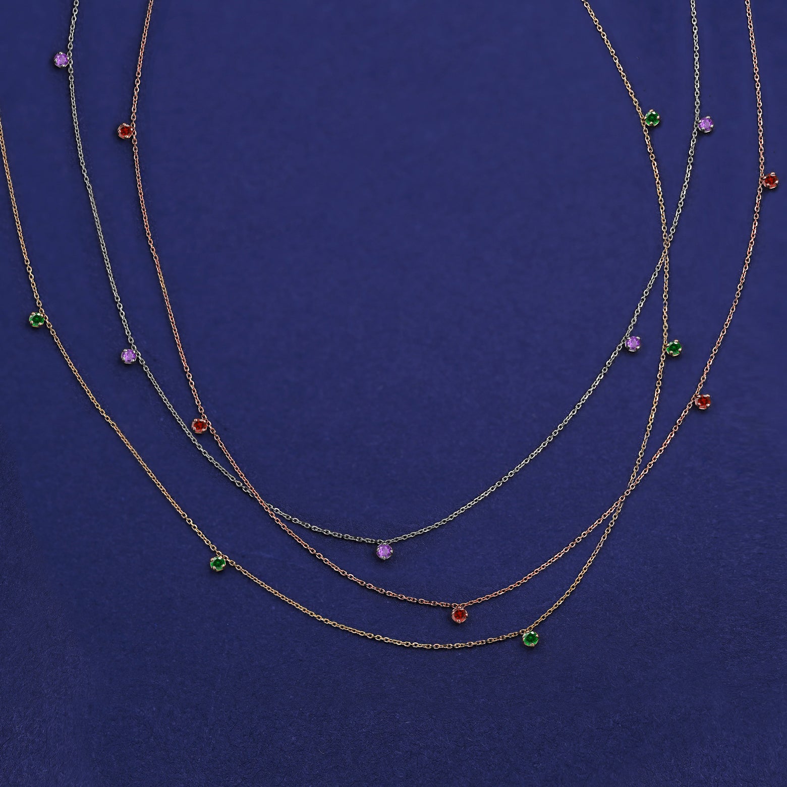Three Five Gemstone Cable Necklaces shown in options of rose, yellow, and white gold