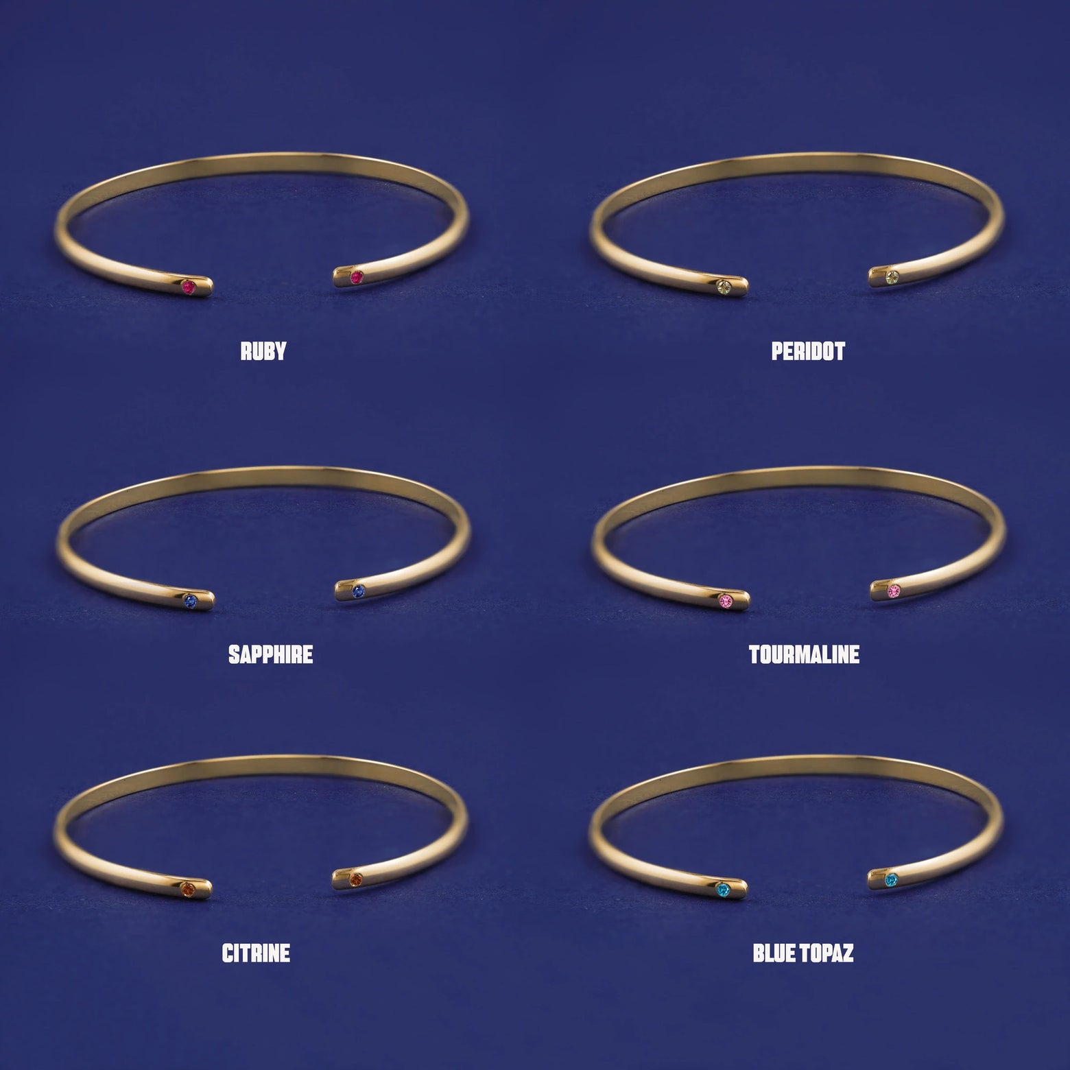 Six versions of the solid yellow gold Gemstone Open Bangle showing 6 different birthstone options