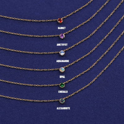 Six versions of the solid yellow gold Gemstone Cable Necklace showing different stone options