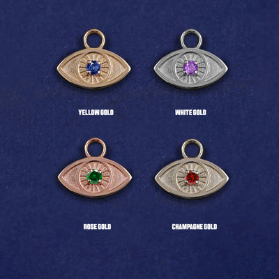 Four versions of the Gemstone Evil Eye Charm shown in options of yellow, white, rose and champagne gold