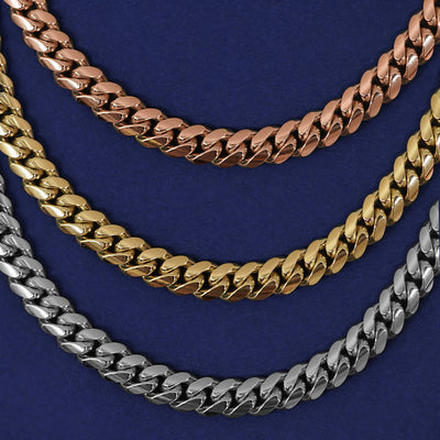 Three versions of the Miami Cuban Chain in options of rose, yellow, and white gold