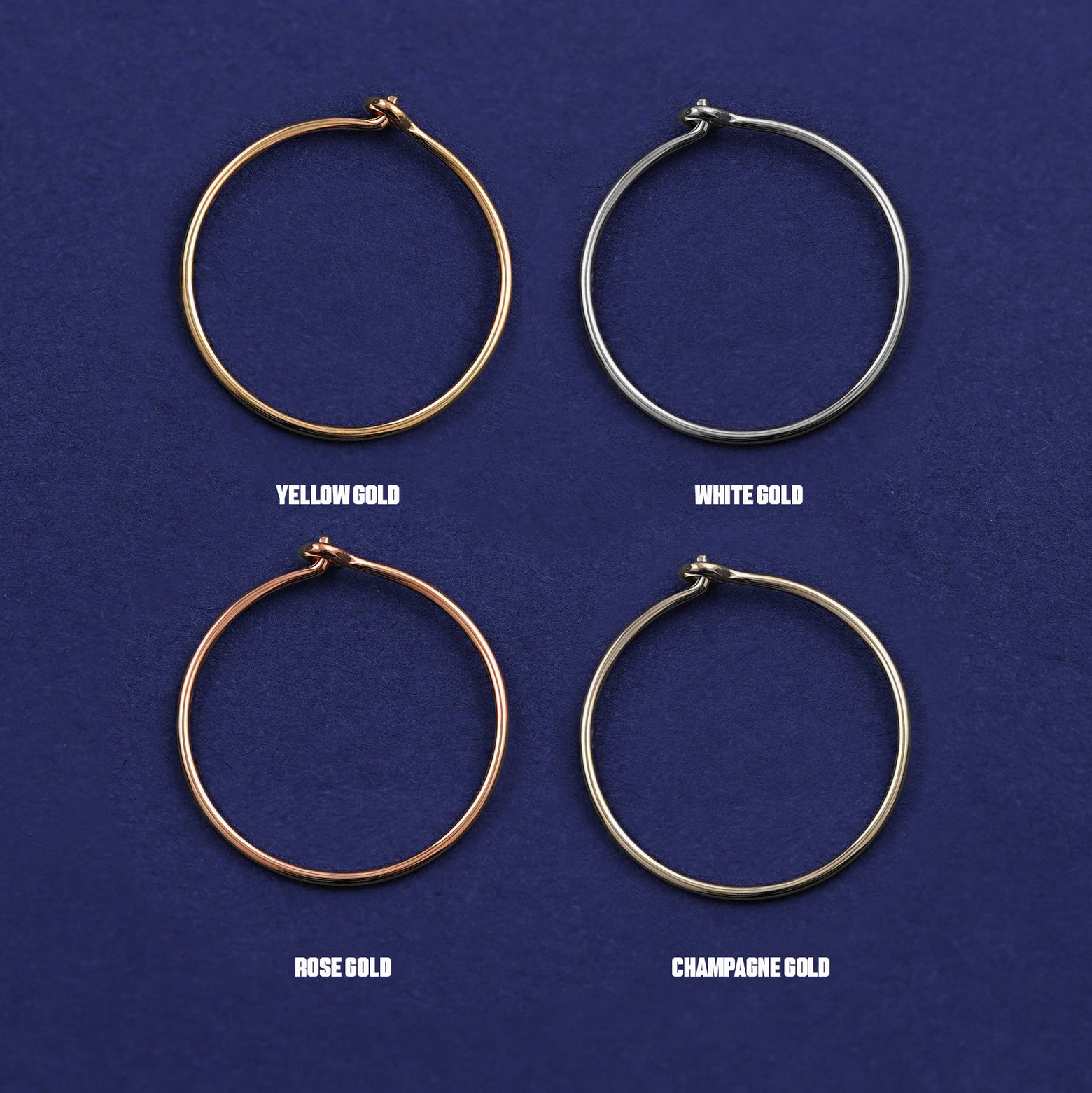 Four versions of the Medium Hoop shown in options of yellow, white, rose and champagne gold