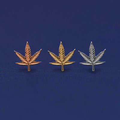 Three versions of a Pot Leaf Earring shown in options of rose, yellow, and white gold