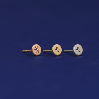 Three versions of a Star Earring shown in options of rose, yellow, and white gold