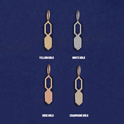 Four versions of the Tanlah Charm shown in options of yellow, white, rose and champagne gold